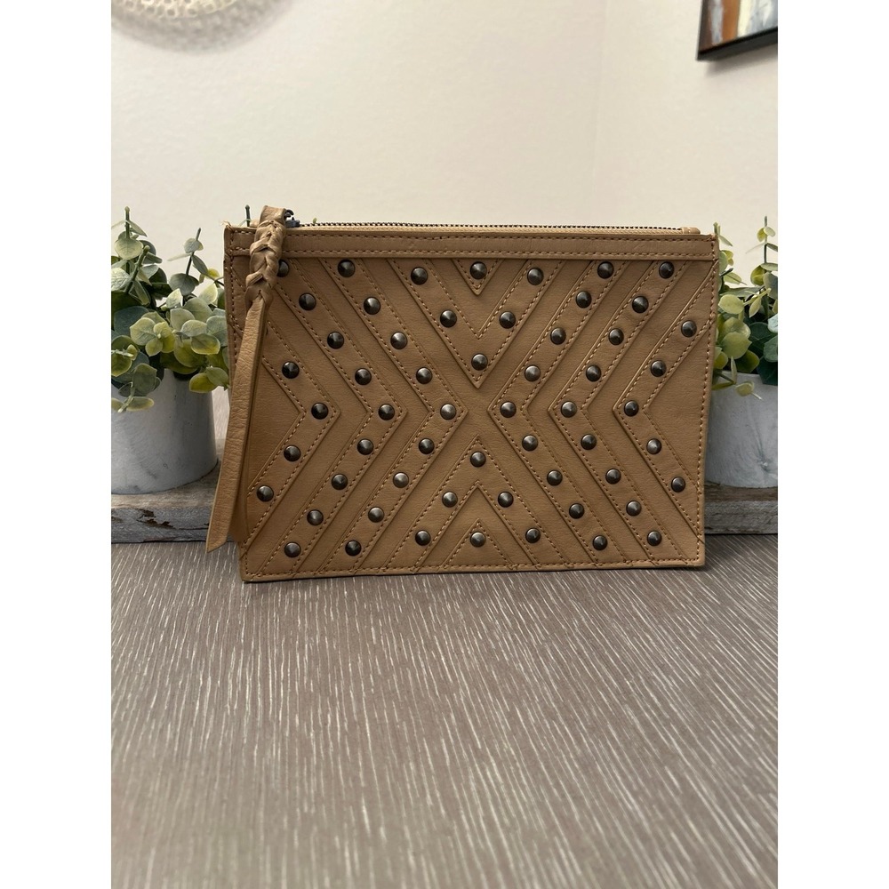 BCBGeneration The Starstruck Clutch in a camel‎ studded faux leather material